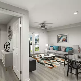 Open concept living and dining room with wood look flooring throughout