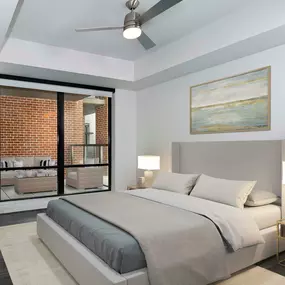 Bedroom with tray ceiling, ceiling fan, and hardwood-style flooring