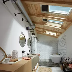 VELUX Skylights brighten the bathroom. Get yours installed by ENHANCE openings