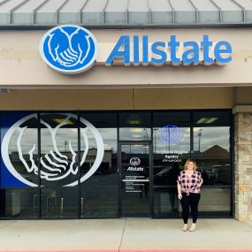 Agency owner, Stephanie Riggins, standing outside of our beautiful office located in Springdale, Arkansas. Come and see us!