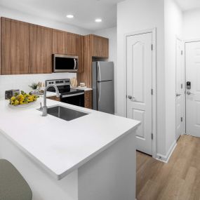 Kitchens include additional counter height seating.