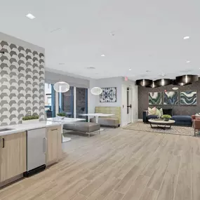 Resident Clubhouse with lounge and entertaining kitchen at Camden Fair Lakes in Fairfax, Virginia