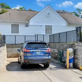 Car care area with vacuum and wash station.