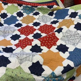 MaryEllen #wicalquiltworks picks up and delivers quilts that she has longarm quilted for our customers. This one, nicknamed the Cowboy Quilt, is headed home to languish on a guest bed, in a room decorated with horses. I think it will be quite happy there!! ????