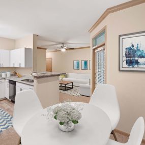 Kitchen with dining space at Camden Holly Springs Apartments in Houston, TX