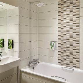 Premier Inn bathroom with bath and shower
