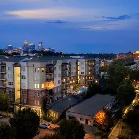 Building exterior with atlanta skyline and ponce city market