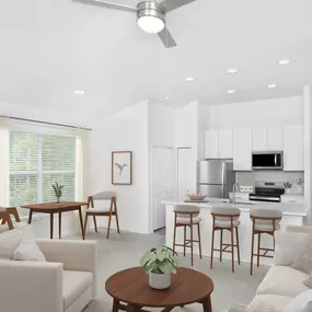 Open-concept living room, kitchen, and dining area at Camden World Gateway apartments in Orlando, FL