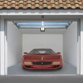 Private garage with car parked inside at Camden World Gateway apartments in Orlando, FL