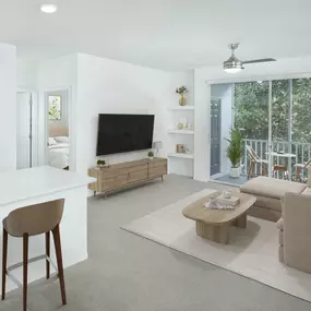 Living room with plush carpet, private balcony, and built-in shelves at Camden World Gateway apartments in Orlando, FL