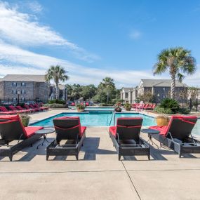 Central, outdoor pool area with plenty of lounge seating.