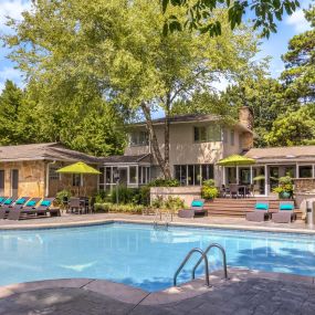 Saltwater swimming pool surrounded by lush landscaping at Camden Fairview in Charlotte North Carolina