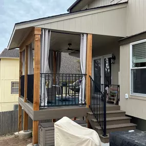 We built this covered deck for our clients in Lenexa, KS using Deckorators decking and fascia to create an outdoor space for them to enjoy for years to come.
