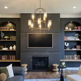 A cozy centerpiece with custom-built charm. This Lenexa, KS living room transformation features bold contrast, warm textures, and timeless design—crafted by Canes Exteriors.