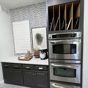 Smart storage meets sleek design. This custom kitchen remodel in Lenexa, KS blends style and function—perfectly crafted by Canes Exteriors.