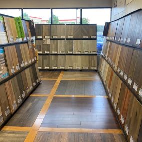 Interior of LL Flooring #1061 - Lorton | Aisle View