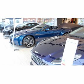 Cars inside the Aston Martin Wilmslow dealership