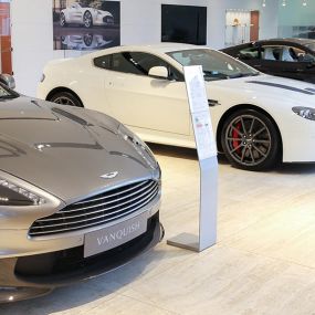 Cars inside the Aston Martin Wilmslow showroom
