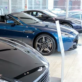 Cars inside the Aston Martin Wilmslow dealership