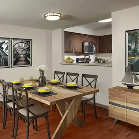 Dining area with room to entertain in traditional finish style at Camden Doral apartments