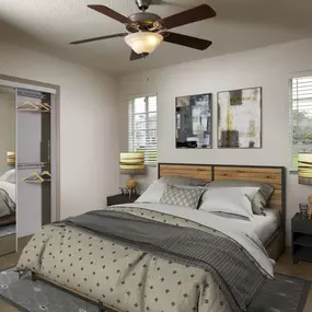 Large bedroom with mirrored closet doors in traditional finish style at Camden Doral apartments