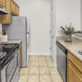 Camden Peachtree City apartments in Peachtree City, GA with tile floor and double sink