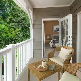 Camden Peachtree City apartments in Peachtree City, GA large balcony with greenery