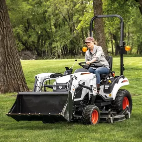 The Bobcat CT1025 with bucket and mid-mount mower