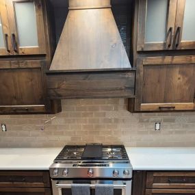 This beautiful vent hood was the perfect compliment to this kitchen remodel!