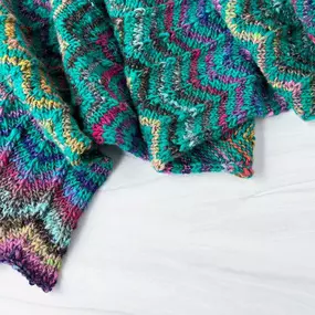 Inject a little color to your weekend knitting and cast on for our new Ripple Scarf, which combines Noro Ito & Malvinas in a color-forward chevron pattern that's addictingly easy to knit!