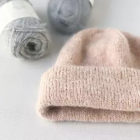 Would you just look at the yummy texture of this incredible Oslo Hat!
 
We knit our sample of this PetiteKnit classic companion style, holding together one strand of Biches + Bûches Le Petit Lambswool (in Light Peach) + one strand of Biches + Bûches Le Petit Silk Mohair (in Nude Pink). This combo creates a pillowy fabric that's soft and plush, with an angelic mohair/silk halo to elevate this everyday hat from ordinary to extraordinary!