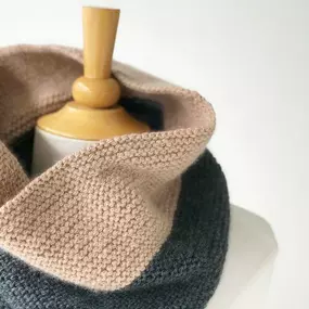 Woolfolk's Ultimate Merino knits up with a dreamy coziness that's luxuriously soft. The versatile color palette also knits up beautifully in color-blocked style, seen here in our Far Garter Cowl!