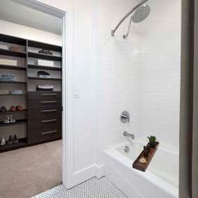 Bathroom and walk-in closet in penthouse apartment home at The Camden in Hollywood, CA