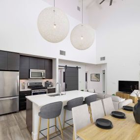 Dining and kitchen in penthouse apartment home at The Camden in Hollywood, CA