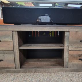Tv stand and wall mount sound bar. Perfect for the guest room.