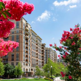 Front exterior of Camden Potomac Yard with beautiful flowers
