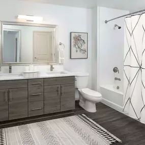 Spacious Bathroom with Double Vanities, Shower and Bathtub