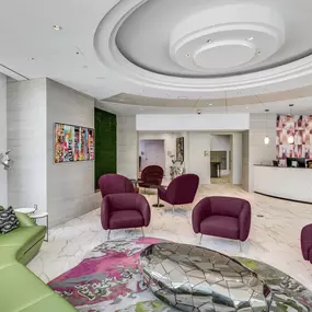 Lobby with a 24-hour concierge at Camden Potomac Yard apartments in Arlington, VA.