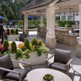 Outdoor seating area overlooking 18th hole of the carolina country club