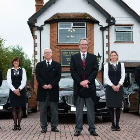 Miles & Daughters Funeral Directors vehicles and staff