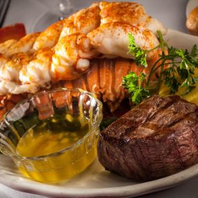The Ultimate Duo! Dive into luxurious surf and turf featuring succulent lobster and perfectly grilled steak.