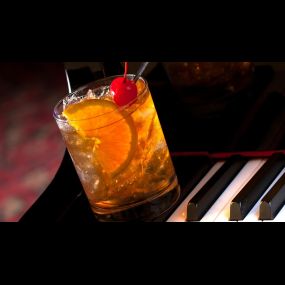 Enjoy the classic sophistication of an Old Fashioned cocktail at Golden Steer Steakhouse.