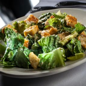 Savor the iconic taste of our famous Caesar salad at Golden Steer Steakhouse.