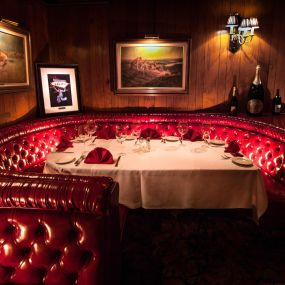Our expansive booth offers the perfect setting for memorable dining moments at Golden Steer Steakhouse.