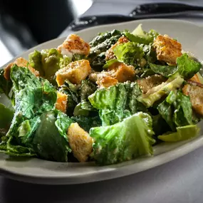 Savor the iconic taste of our famous Caesar salad at Golden Steer Steakhouse.