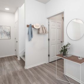 Entryway foyer in townhome near powder room