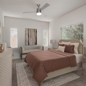 Bedroom with ceiling fan and windows