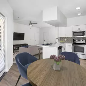 Open concept dining room near kitchen and patio