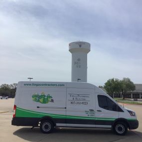 The Grapevine water tower and Tioga Plumbing & Drain service van in Grapevine Texas.