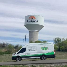 One of the Tioga Plumbing & Electric vans in Aledo Texas in front of the Aledo Water Tower.